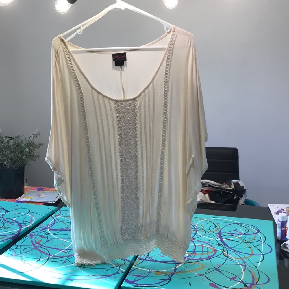 Cream torrid shirt, size 2, with crochet detail.